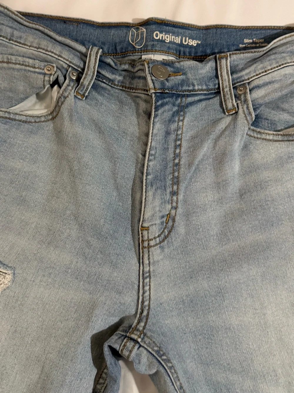 Original Use Slim Taper Distressed Light Wash Jeans